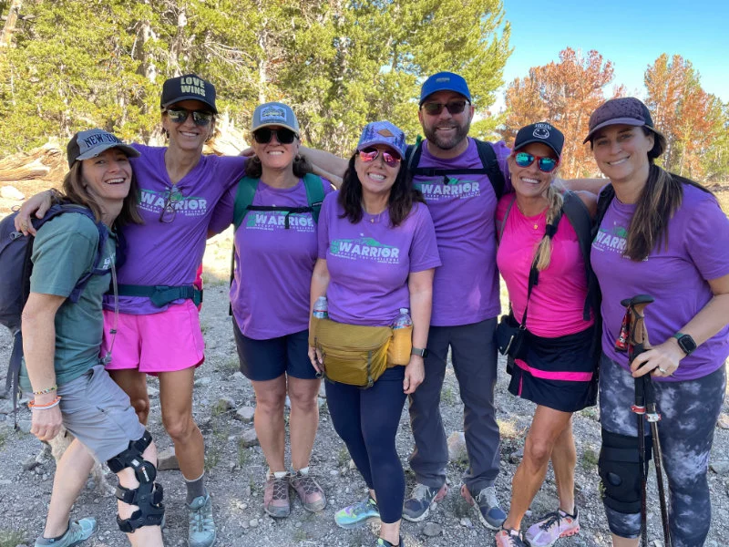 A group of hikers setting out for a day of hiking on the Mount Rose Summit Trail for the 2023 Be Warrior Challenge Hike