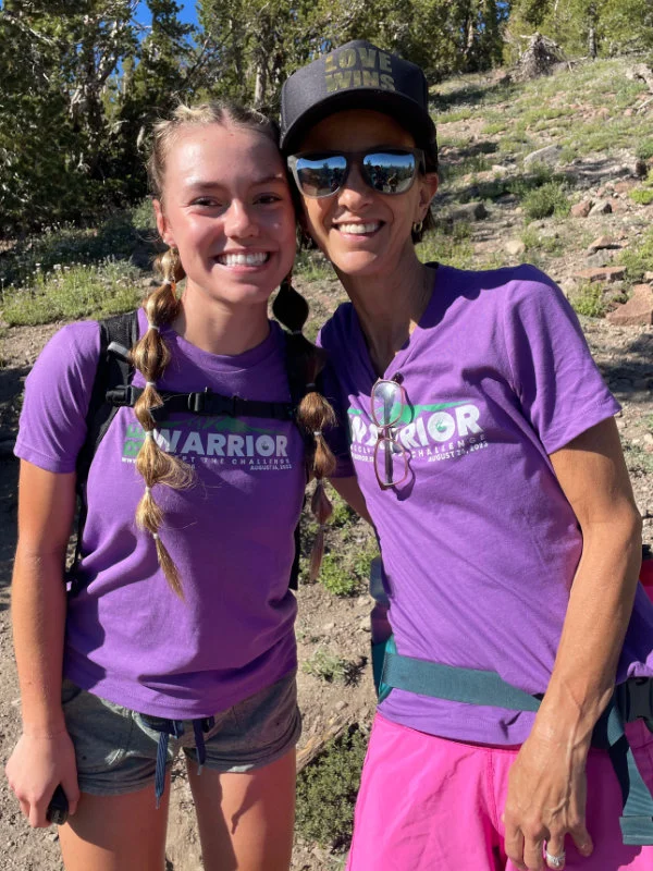 Two women hikers on the Mount Rose Summit Trail for the 2023 Be Warrior Challenge Hike