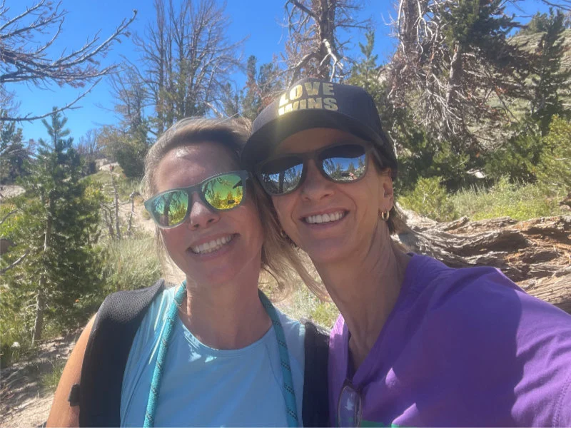 Two women hikers on the Mount Rose Summit Trail for the 2023 Be Warrior Challenge Hike